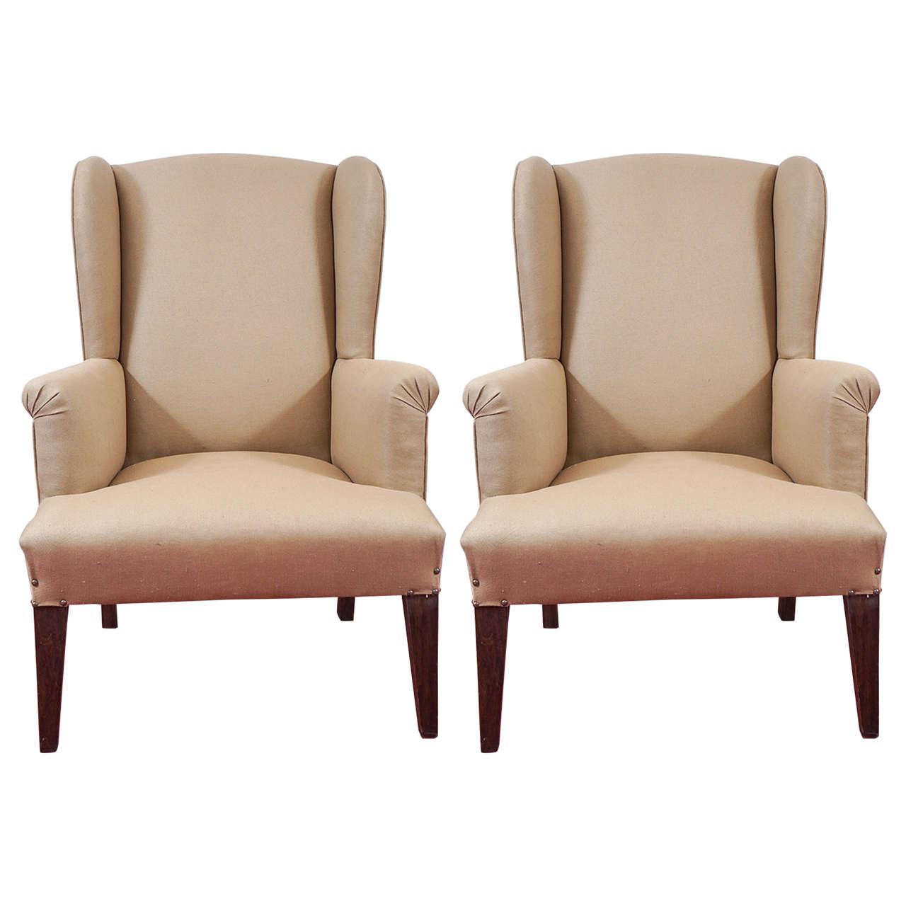 Pair of linen wingback chairs, 1970s