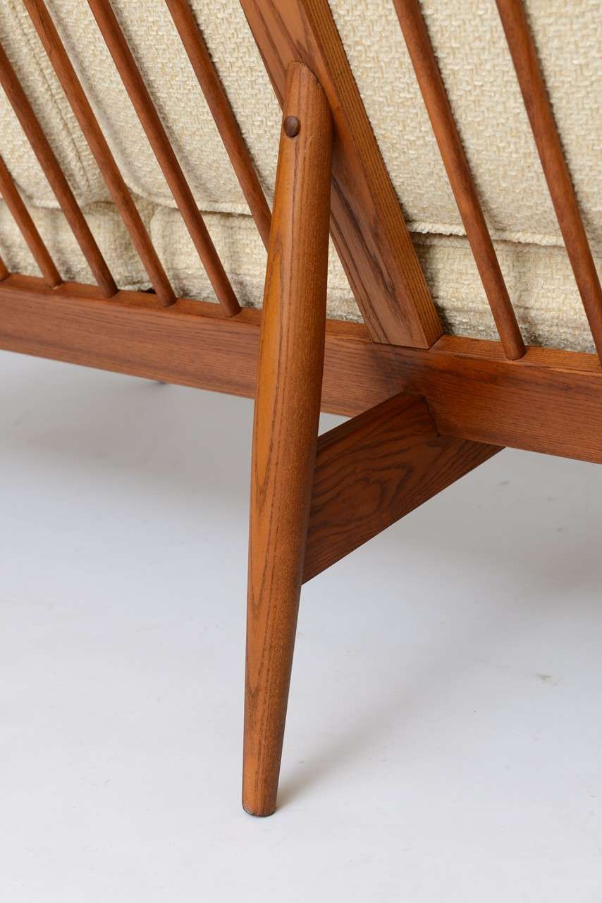 Danish 50s Spindle Back Wide Arm Three Seat Sofa at 1stdibs