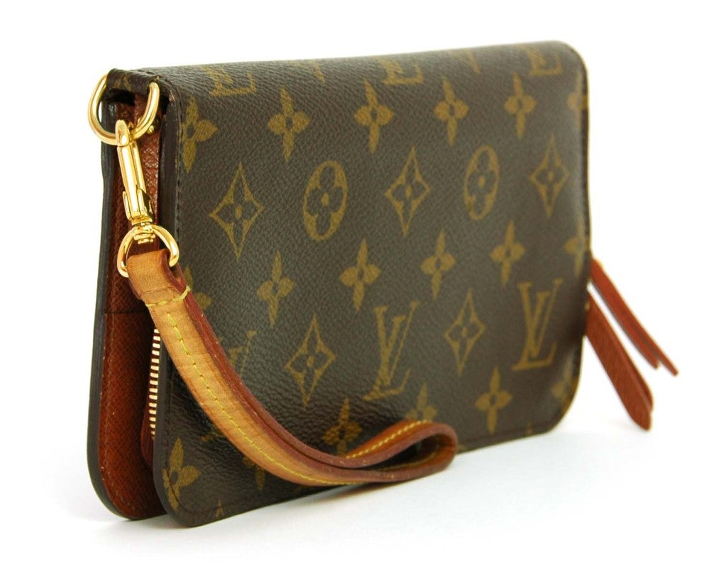 LOUIS VUITTON Monogram Insolite Wallet with Wristlet rt. $825 at 1stdibs