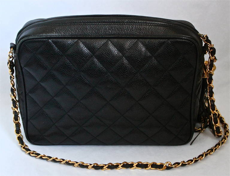 90&#39;s CHANEL black caviar quilted leather cross body bag with gilt chain and tassel at 1stdibs